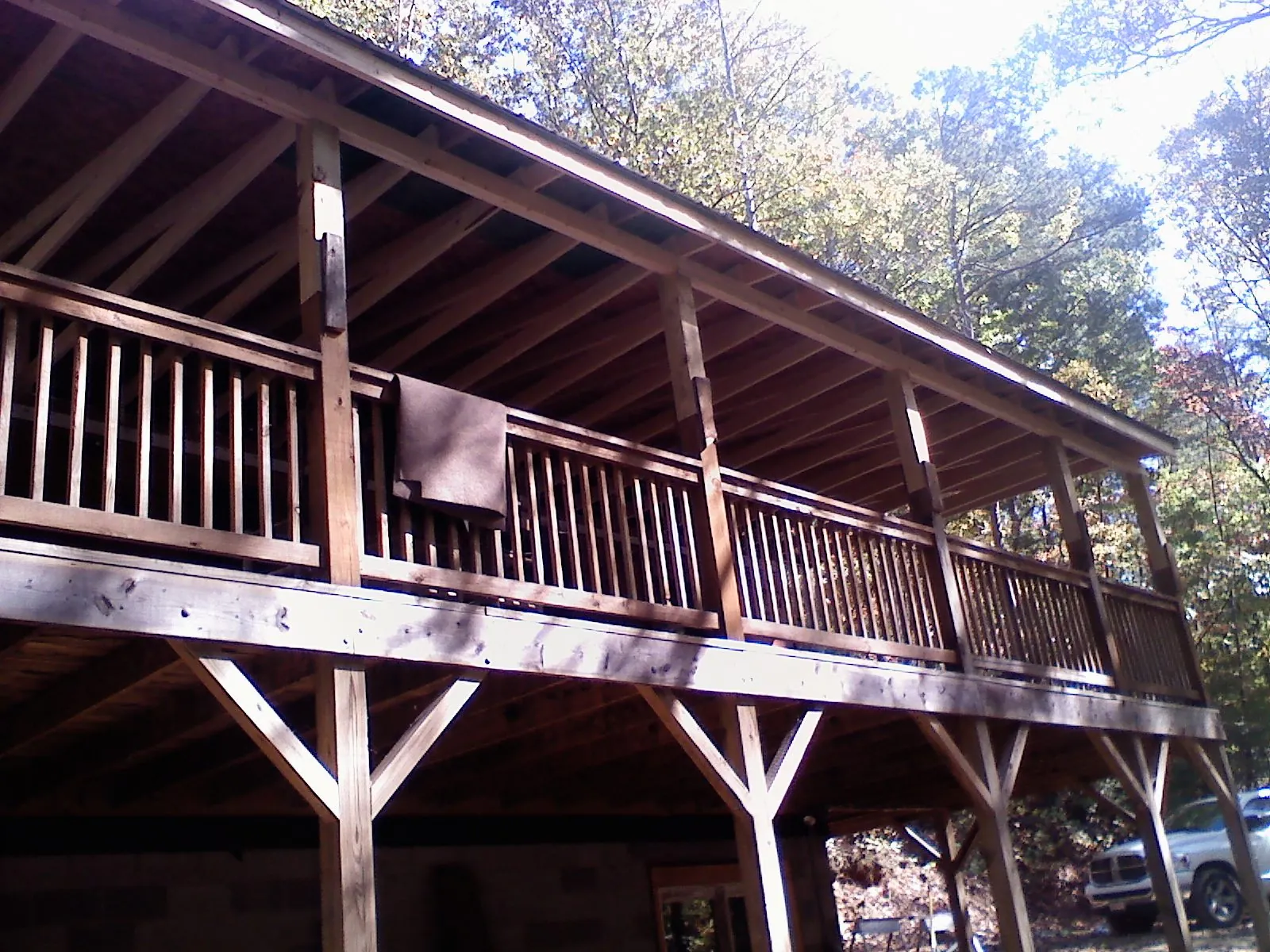 Timber framing under a new elevated porch and deck — Roof Leak Repair in Marblehead by Roofing Brothers